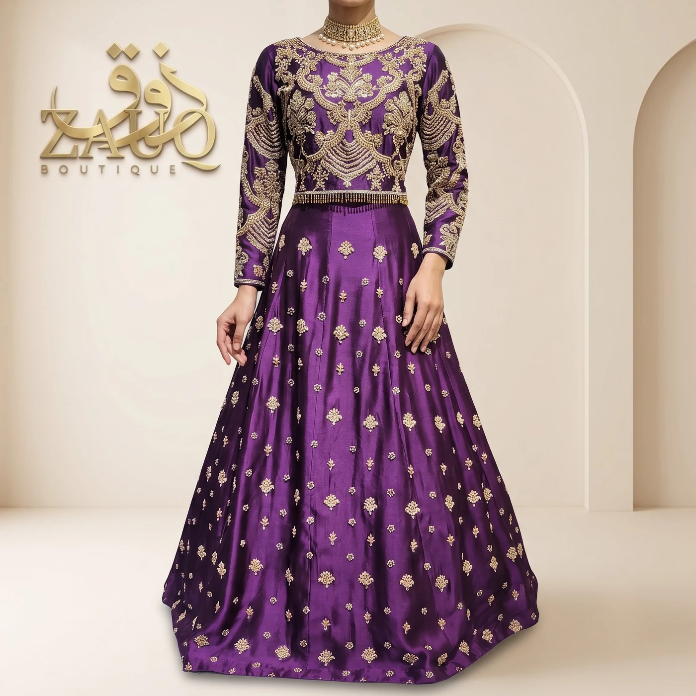 Deep purple silk with a heavily worked bodice and gold motifs down the skirt.