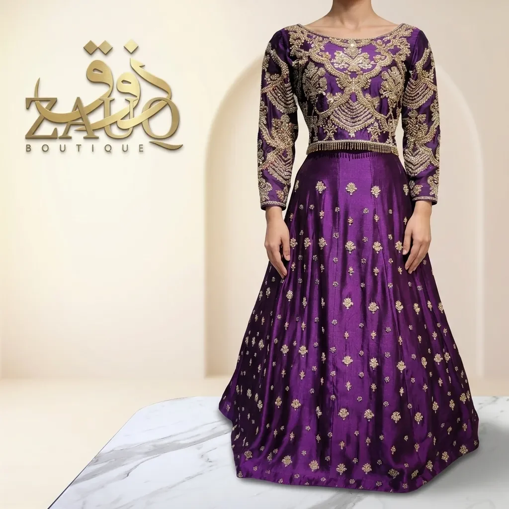 Deep purple silk with a worked bodice — an evening statement.