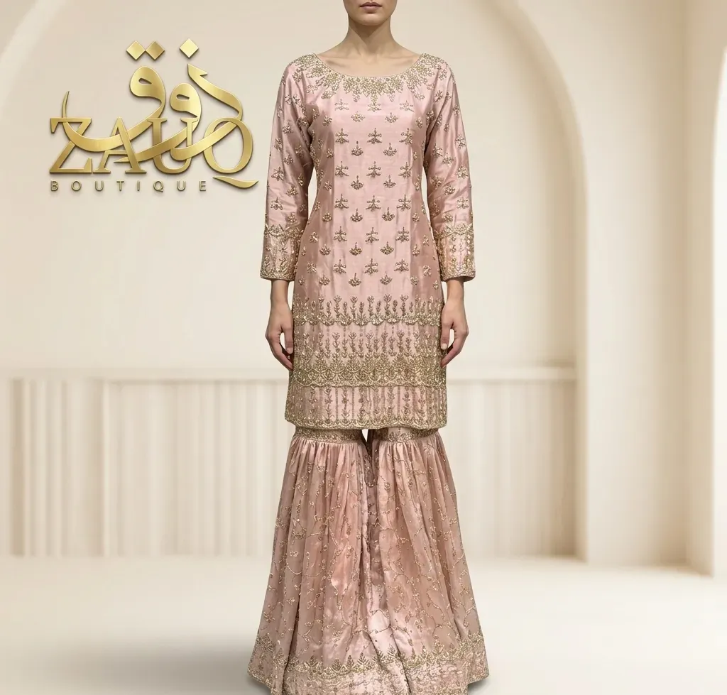 Blush pink with fine tonal embroidery and a soft fall.