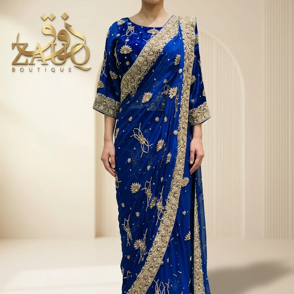 Royal blue with a gold-worked border and pallu.